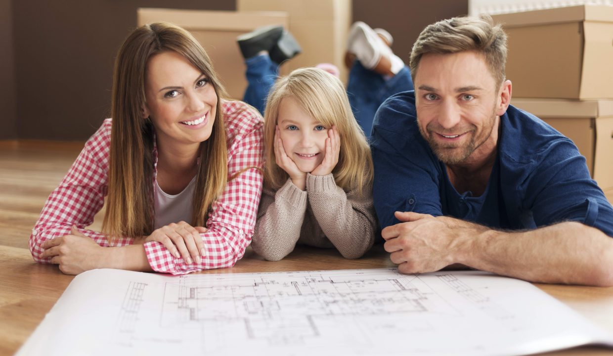 Happy family planning their new apartment